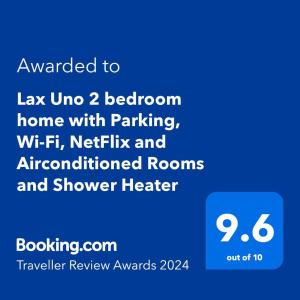 Un certificat, premiu, logo sau alt document afișat la Lax Uno 2 bedroom home with Parking, Wi-Fi, NetFlix and Airconditioned Rooms and Shower Heater