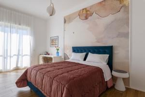 Posteľ alebo postele v izbe v ubytovaní Cas’ A Mare - Beachfront Luxury Suites