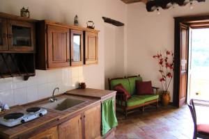 Kuchyň nebo kuchyňský kout v ubytování B & B Stillachiara