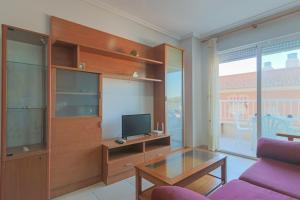 TV a/nebo společenská místnost v ubytování 040 - Gran Playa 001 - comfortHOLIDAYS
