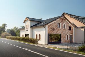a house on the side of a road at Apartmán na Faře in Loučná nad Desnou