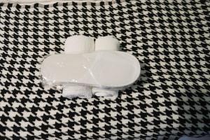 a toilet with two rolls of toilet paper on a wall at Changsha Fuxiangyuan International Hostel in Changsha