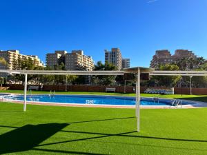 Bazén v ubytování ACV - Torremar-2ª línea planta 1 norte nebo v jeho okolí