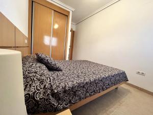 Postel nebo postele na pokoji v ubytování ACV - Torremar-2ª línea planta 1 norte