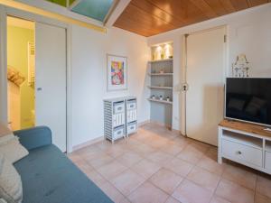 Televízia a/alebo spoločenská miestnosť v ubytovaní Casa Giulia - Appartamento a San Gimignano