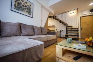Χώρος καθιστικού στο Apartmani RAZVIGORA - DivčiNova
