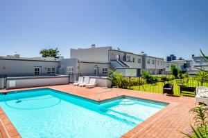 a swimming pool on the roof of a house at 211 De Waterkant Piazza in Cape Town
