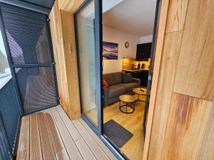 Posedenie v ubytovaní Benecko moderní apartmán A30 by AlkaTravel + 27 fotografií
