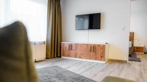 TV tai viihdekeskus majoituspaikassa E&B Apartments Waiblingen