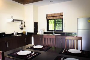Cuisine ou kitchenette dans l'établissement Panya Resort Koh Samui