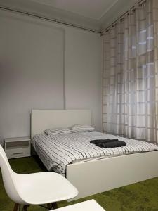 Postel nebo postele na pokoji v ubytování Apart Lwowska