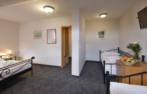 Ένα ή περισσότερα κρεβάτια σε δωμάτιο στο Hotel Boston