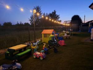 a playground with many different types of play equipment at Comfortable holiday homes for 6 people, Niechorze in Niechorze