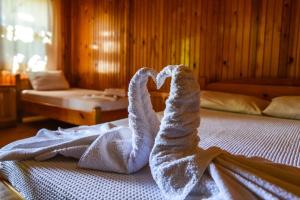 Postel nebo postele na pokoji v ubytování YAVUZ MOTEL ADRASAN