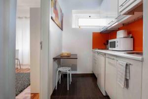 Η κουζίνα ή μικρή κουζίνα στο Apartment 1 Center Coimbra