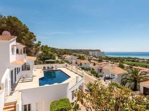 an image of a villa with a swimming pool and the ocean at Opulent Son Bou Villa 5 Bedrooms Villa Alis Central Panoramic Sea Views Luxurious Interiors in Son Bou