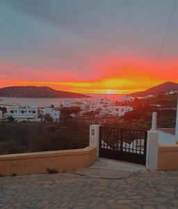 a view of a sunset from a house at Orizodas in Leipsoi