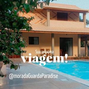une villa avec une piscine sur l'île des antiparos dans l'établissement Morada Guarda Paradise, à Guarda do Embaú