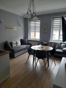Posedenie v ubytovaní Novitas Apartments