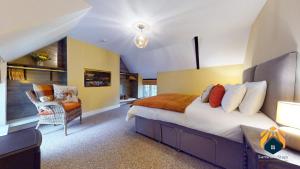 Postel nebo postele na pokoji v ubytování 4-Bed Apartment With Cosy Pub