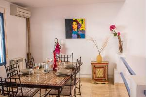 a dining room with a table and chairs at Casa Sirena VFT/AL/00853 in San José