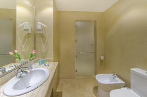 Kúpeľňa v ubytovaní Toledo Amman Hotel