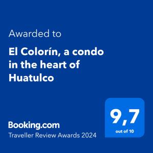 Un certificat, premiu, logo sau alt document afișat la El Colorín, a condo in the heart of Huatulco