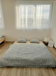 Un ou plusieurs lits dans un hébergement de l'établissement Beautiful Apartment 10 min from Zurich! Netflix!