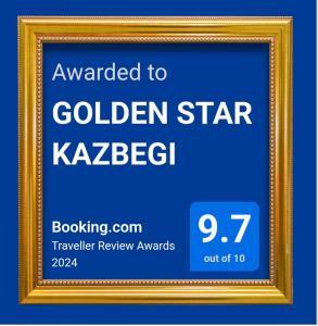 a gold picture frame with the words awarded to golden star kazebatch at GOLDEN STAR KAZBEGI in Kazbegi