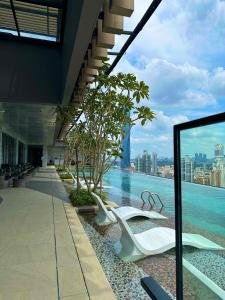 a hotel with a view of the water in a building at AXON RESIDENCE AT BUKIT BiNTANG KUALA LAMPUR in Kuala Lumpur