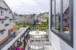 Balkón nebo terasa v ubytování Kim Little Hotel Dalat