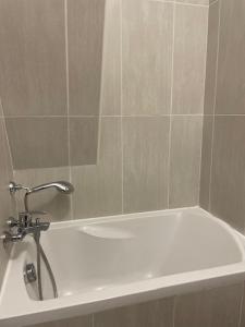 Ένα μπάνιο στο Appartement Héritage - 1 chambre 4 personnes