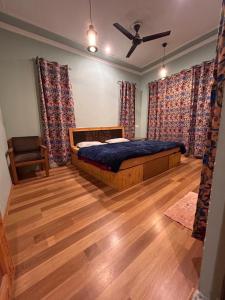 Letto o letti in una camera di John's Homestay