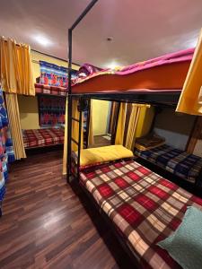 Krevet ili kreveti u jedinici u okviru objekta John's Homestay
