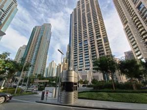 a view of a city with tall buildings at 3 BEDROOM APARTMENT ON MONTHLY RENT in Dubai