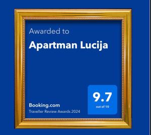 a picture frame with the text awarded to aprilanan lucida at Apartman Lucija in Gradići