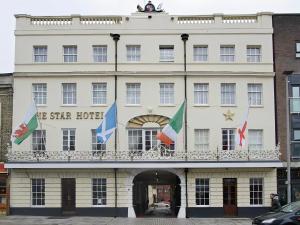a hotel with flags on the front of it at The Star Hotel in Southampton