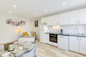 Nhà bếp/bếp nhỏ tại Cozy Appart 5 à 3' de la gare - Cozy Houses +20 ảnh