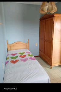 En eller flere senge i et værelse på Apartamento Marbi