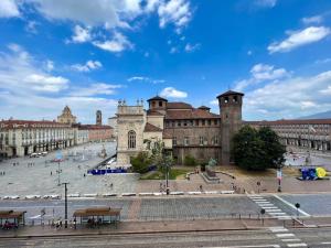 a large building with a plaza in front of it at Il Re di Torino [Zona Migliore della Città] in Turin