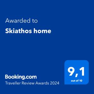 a blue screen with the text awarded to skittles home at Skiathos home in Skiathos