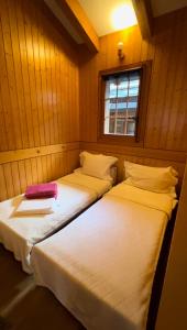 Tempat tidur dalam kamar di Mazot Agora & Spa Family Trip - Chalet Ouest R+1