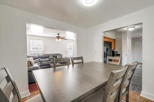 a dining room and living room with a table and chairs at Pet-Friendly Silver Spring Home 2 Mi to Downtown! in Silver Spring