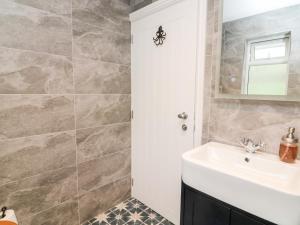 Vannituba majutusasutuses Captains Lodge +22 fotot