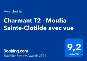Certyfikat, podpis lub inny dokument wystawiony w obiekcie Charmant T2 - Moufia Sainte-Clotilde vue Mer & Montagne