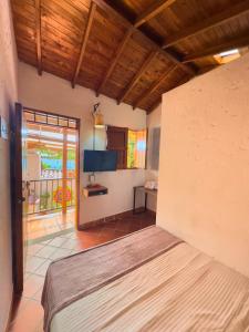 Ένα ή περισσότερα κρεβάτια σε δωμάτιο στο Encomendero Hotel -Centro Histórico-