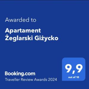 Sertifikāts, apbalvojums, norāde vai cits dokuments, kas ir izstādīts apskatei naktsmītnē Apartament Żeglarski Giżycko