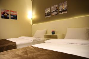Postel nebo postele na pokoji v ubytování Regal view Aparthotel