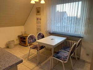 Χώρος καθιστικού στο Ferienhaus Brandes Wohnung 4 +3 φωτογραφίες