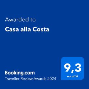 a blue text box with the words awarded to casa alla costa at Casa alla Costa in Mormanno